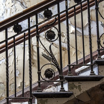 Main staircase detail: wrought iron and an elaborate feature for an office building. Credit Daria Casement