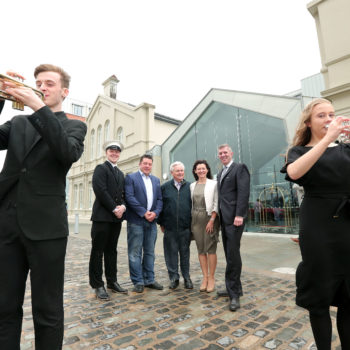 Press Release image 

Press Eye - Belfast - Northern Ireland - 10th September 2017 

Titanic Hotel Belfast has opened with fanfare in the city's Titanic Quarter where the Harland & Wolff headquarters once stood. The £28m Harcourt operated hotel tells the story of Belfast's shipbuilding and maritime history of the past 100 years. 

The Drawing Offices, where Titanic itself was designed, have been fully restored to their former glory thanks to a £5m grant from the Heritage Lottery Fund's Enterprise Fund.

With 119 suites boasting views of Harland & Wolff cranes to the east and the Titanic Slipways to the west, Titanic Hotel Belfast is a unique heritage experience adding to Belfast's booming tourist offering.

Pictured at the official opening along with musicians from the Ulster Youth Orchestra is Philip Rafferty, James Eyre, Titanic Quarter, Pat Doherty of Harcourt Developments, Kerrie Sweeney,  Titanic Foundation and Adrian McNally, General Manager at the official opening this afternoon.

Photo by Kelvin Boyes / Press Eye.