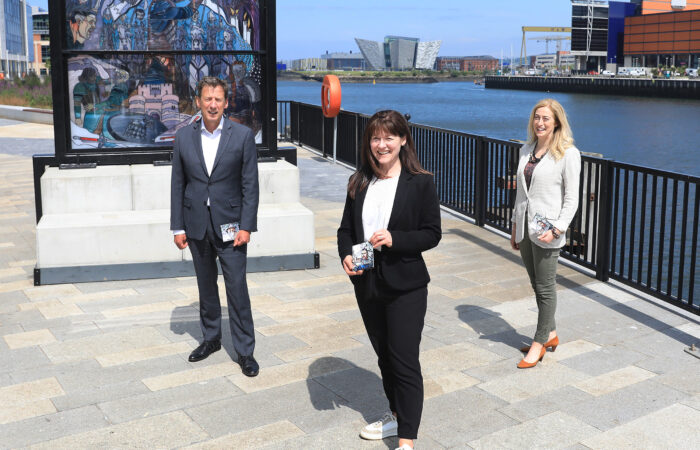 Shane Clarke, Tourism Ireland’s Director of Corporate Services, Policy & Northern Ireland; Kerrie Sweeney, CEO, Maritime Belfast Trust; and Julie McLaughlin, Experience Development Officer, Tourism NI, at the Stark window on Belfast’s Maritime Mile.