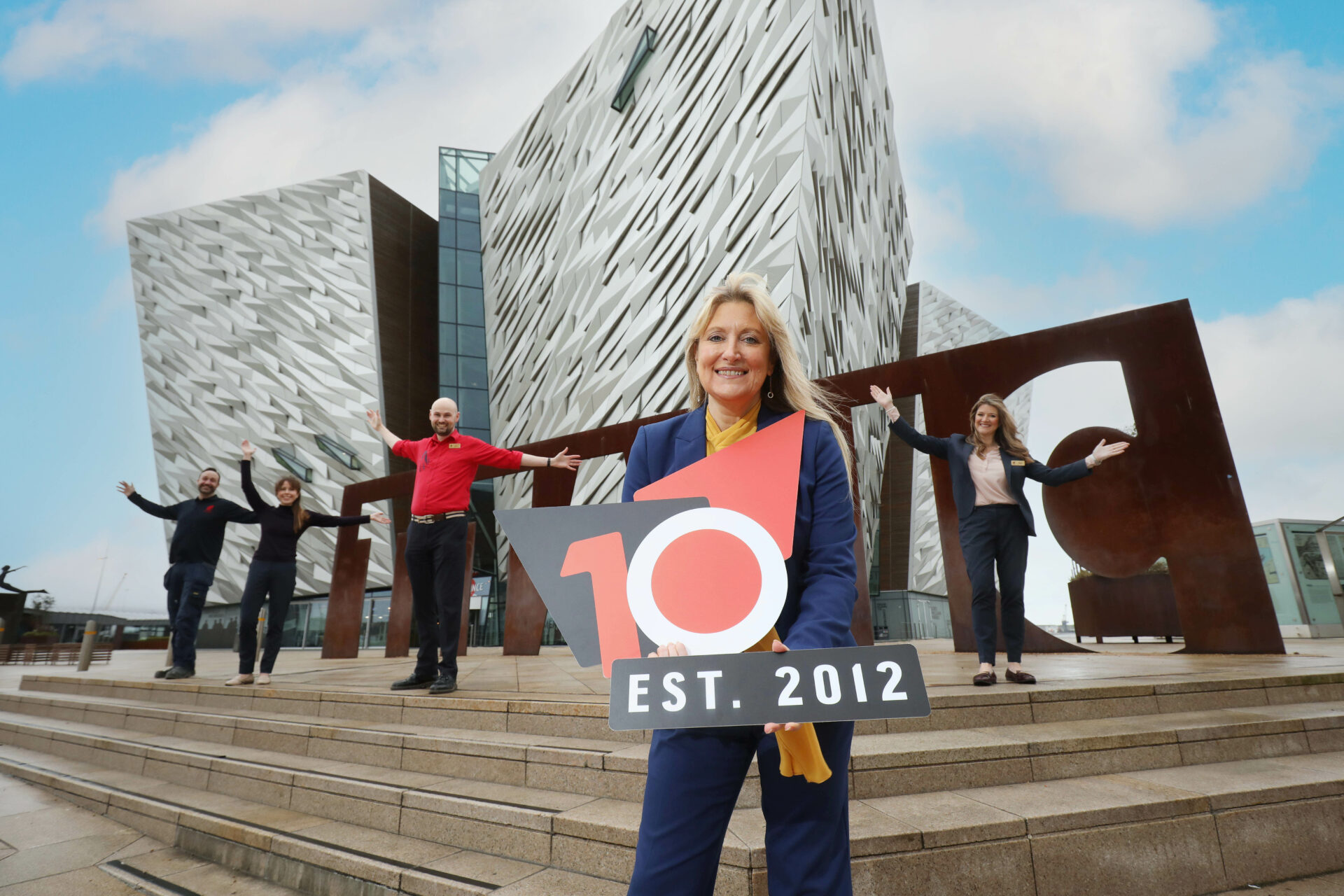 Press Eye - Belfast - Northern Ireland - 

Thursday 3rd  February 2022 

Photo by Daren Kidd // Press Eye 
 
TITANIC MEMORIES…Titanic Belfast is celebrating its 10th birthday next month and to mark this momentous occasion, the world-leading tourist attraction is inviting people to share their favourite Titanic Memories from over the last decade for the chance to be included in a special show-reel. 
 
Pictured with Titanic Belfast’s Chief Executive, Judith Owens MBE, are team members who have worked at the world-leading tourist attraction since it opened in 2012, Matt Prescott, Maintenance Technician; Eve Buchanan-Graham, Executive Office Manager; Jonny Kelso, Visitor Experience Crew and Judith Colhoun, Duty and Events Officer.